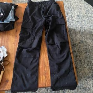 John Calt, California, black cargo pants